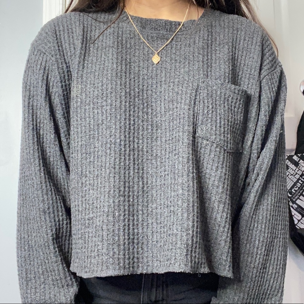 Long sleeve shirt with pocket.